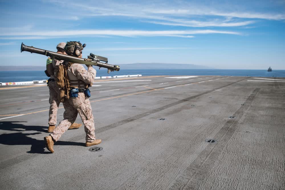 Marines carrying Stinger missiles