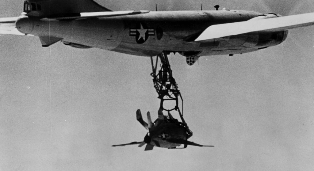 McDonnell XF-85 wonder-weapon being carried by EB-29 