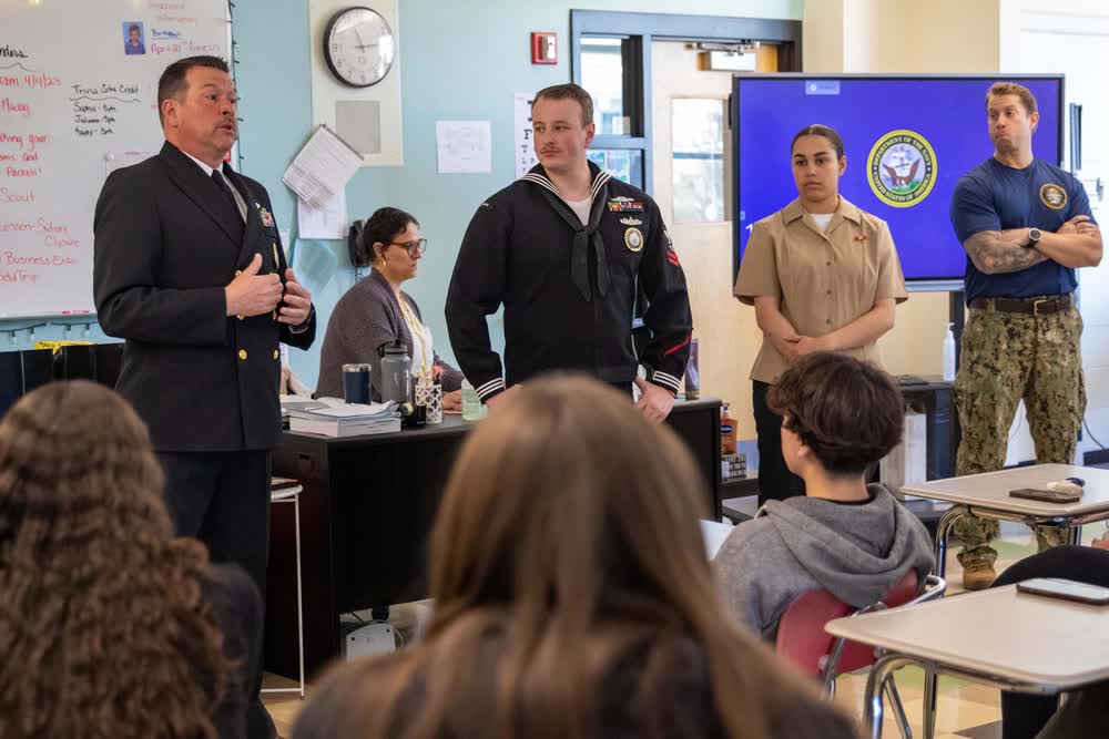 Navy sailors in school