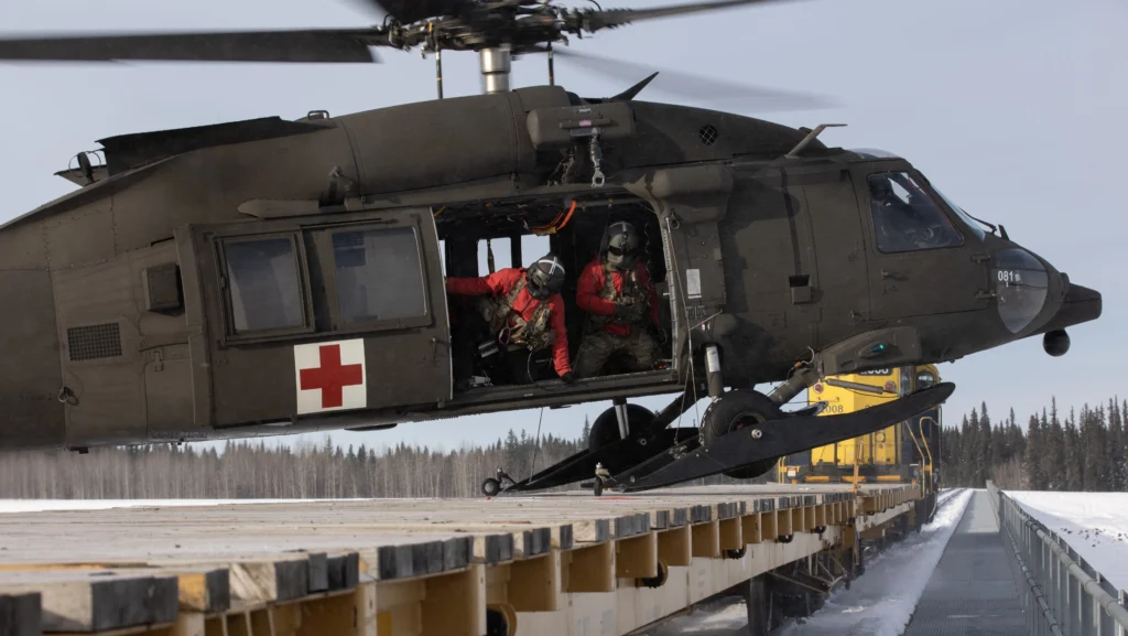 Black Hawk lands on train